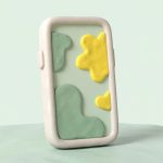 Ilustrasi Galaxy S22 gaya clay dengan layar abstrak hijau dan kuning